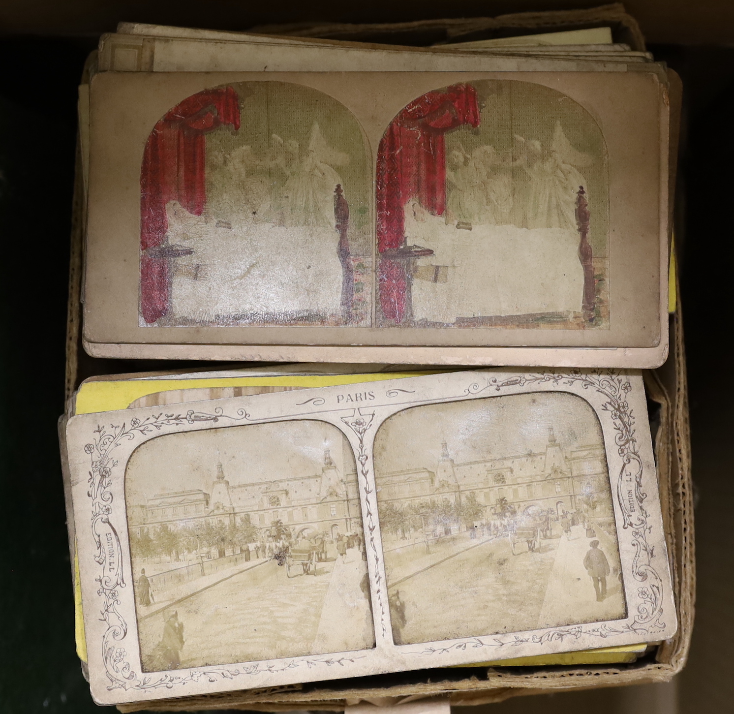 A Victorian burr walnut stereographic viewer, and a box of stereographic photographs
